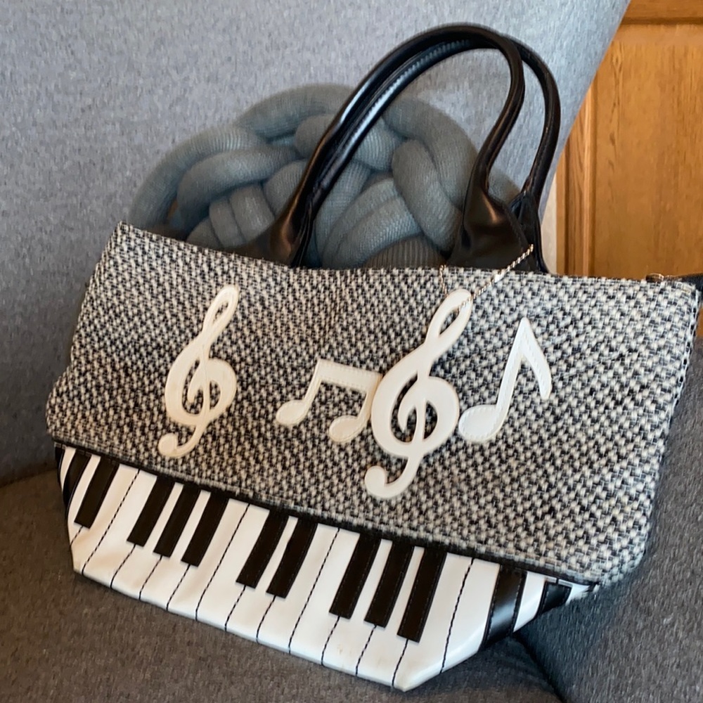 Unique boutique purse with music embroidery